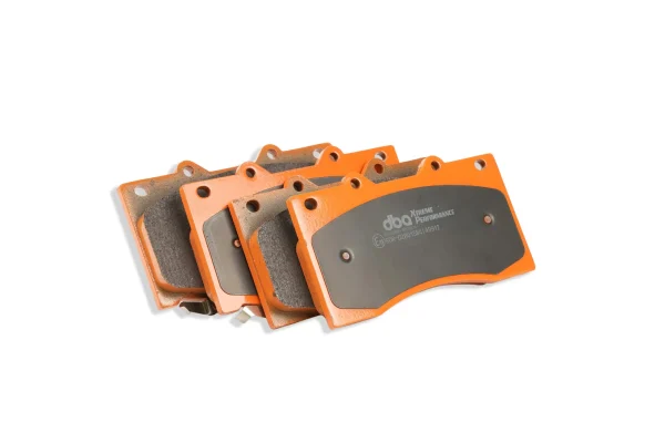 DB2242XP_02_real_photo.webp DBA Xtreme Performance Front Brake Pad Set for Nissan Patrol Y62