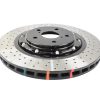 Silver DBA 5000 Series 356mm cross-drilled and dimpled front brake disc with black center hub and colored heat stripes.